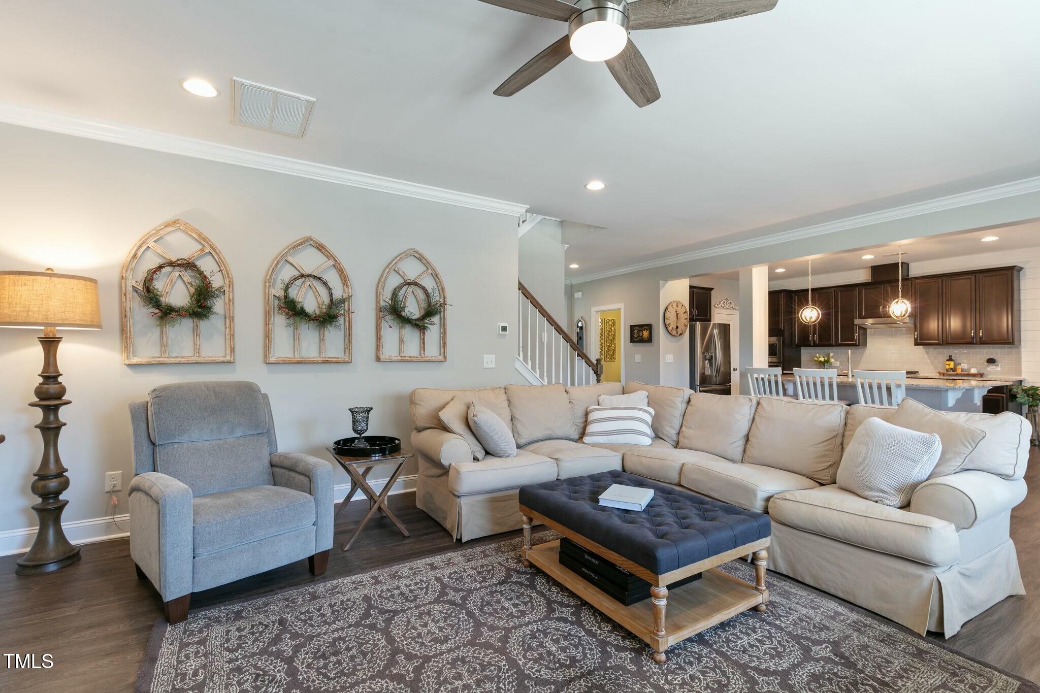 3508 Longleaf Estates Drive Raleigh, NC 27616 - Photo 15 of 45 a living room with furniture and a large window