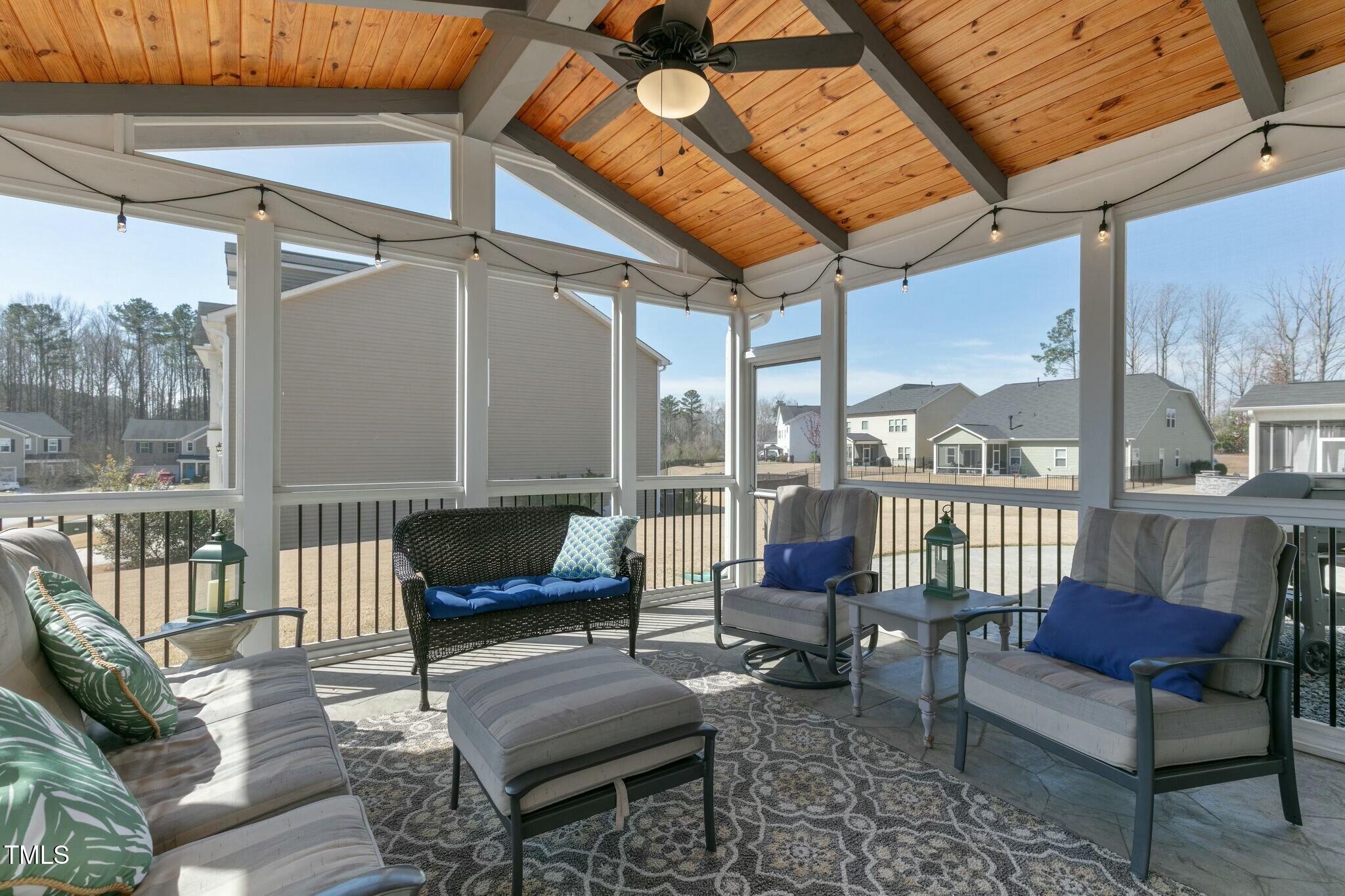 3508 Longleaf Estates Drive Raleigh, NC 27616 - Photo 18 of 45 a balcony with furniture and a rug