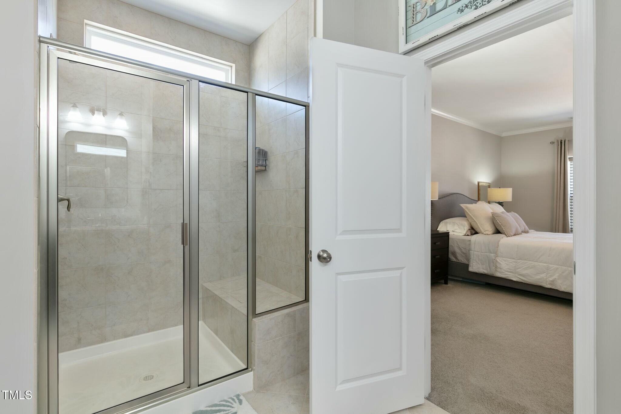 3508 Longleaf Estates Drive Raleigh, NC 27616 - Photo 26 of 45 a en suite bathroom with a shower