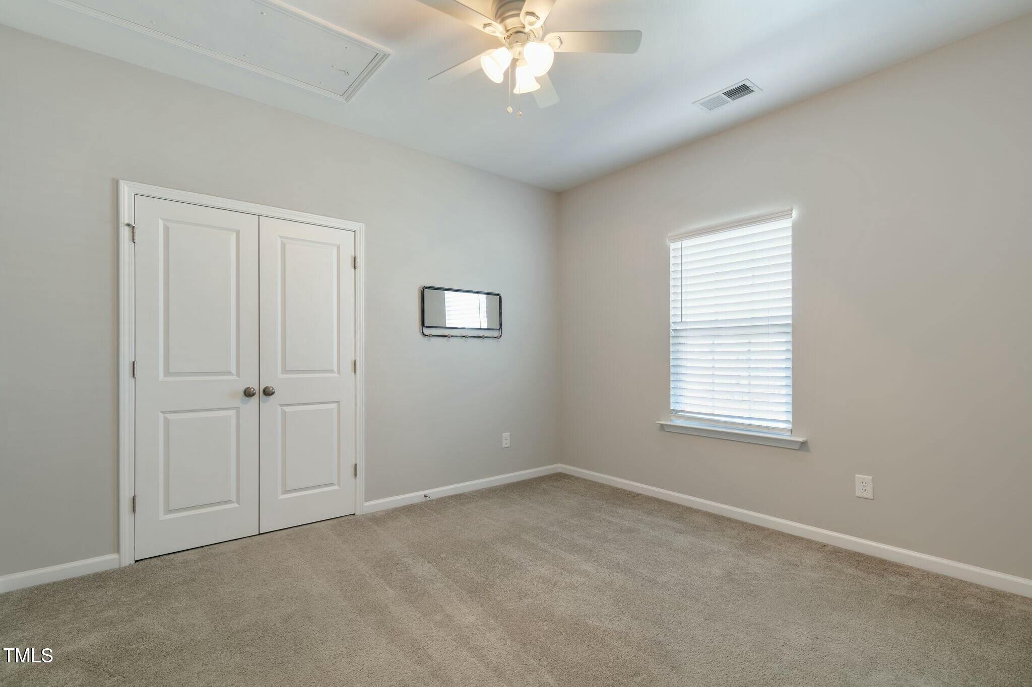 3508 Longleaf Estates Drive Raleigh, NC 27616 - Photo 33 of 45 a view of an empty room with a window
