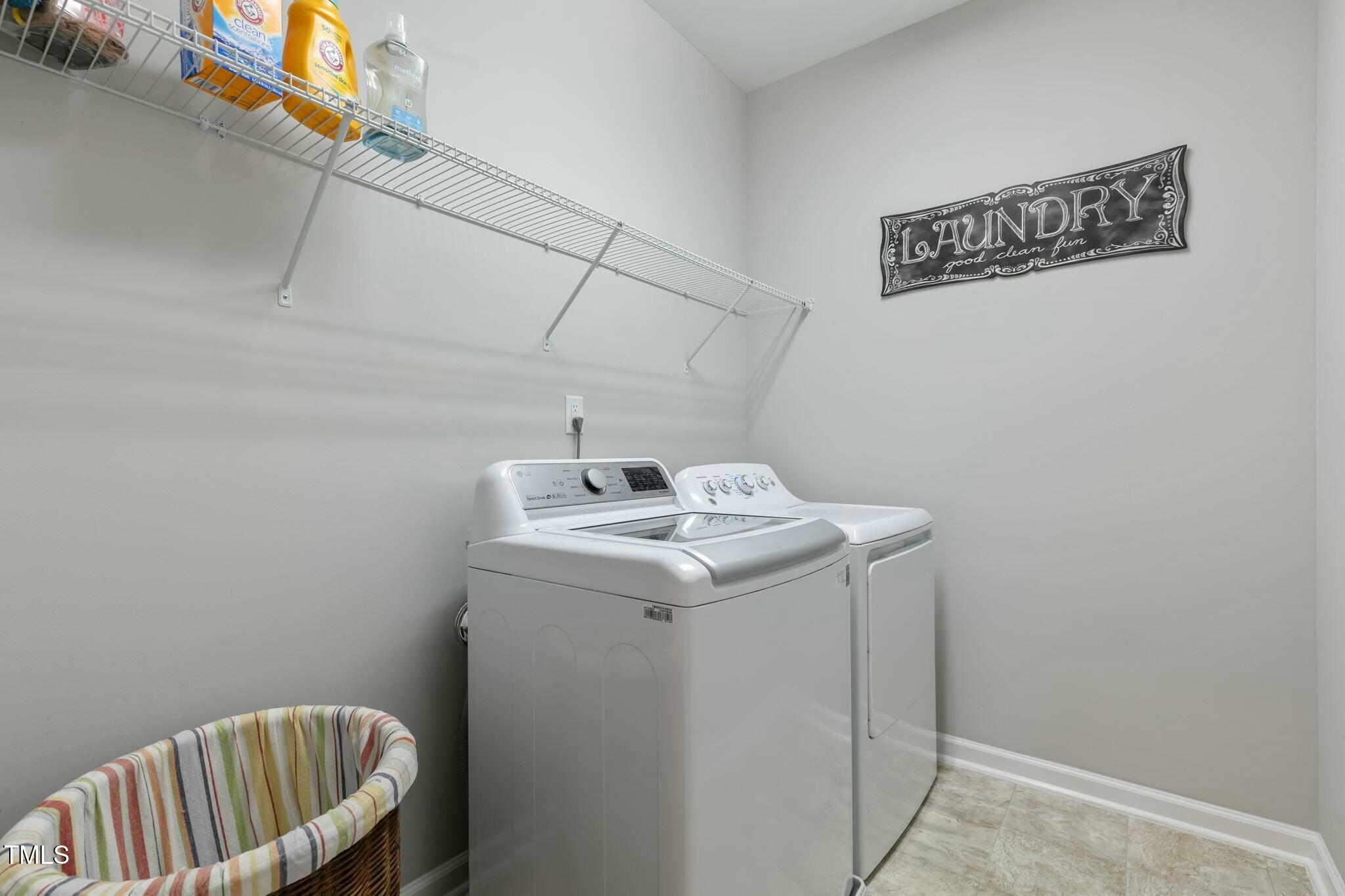 3508 Longleaf Estates Drive Raleigh, NC 27616 - Photo 35 of 45 a utility room with dryer and washer