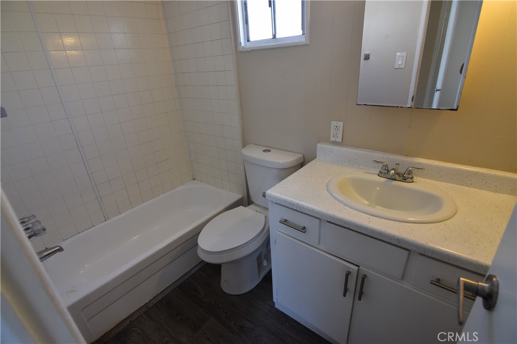 109 1st Avenue, Unit 3 Pacifica, CA 94044 - Photo 12 of 23 a bathroom with a sink toilet and shower