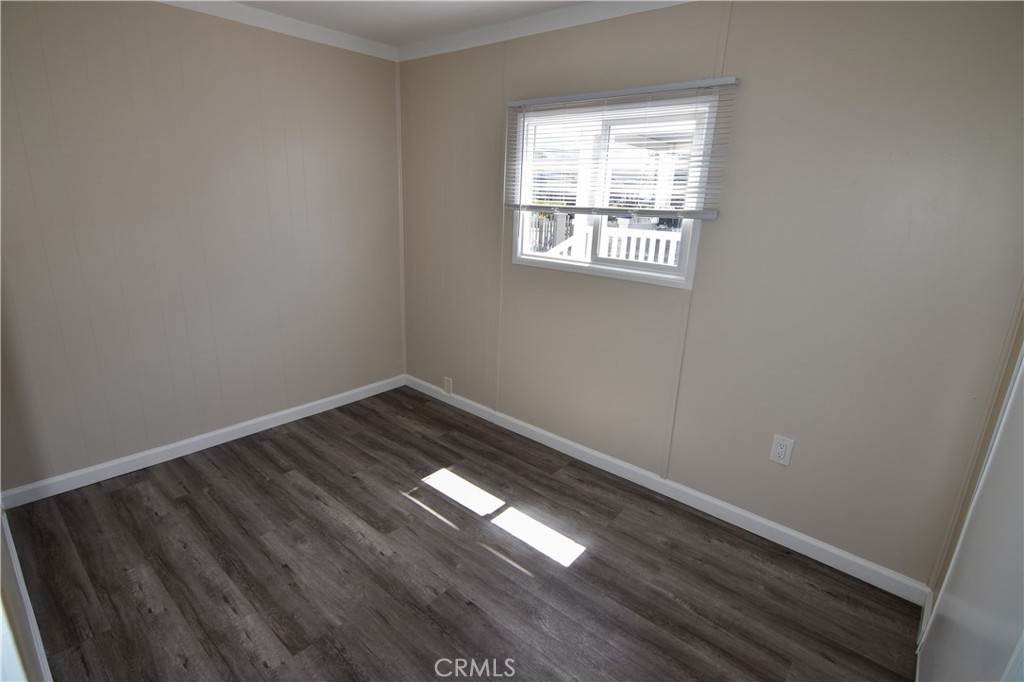 109 1st Avenue, Unit 3 Pacifica, CA 94044 - Photo 13 of 23 a view of empty room with wooden floor