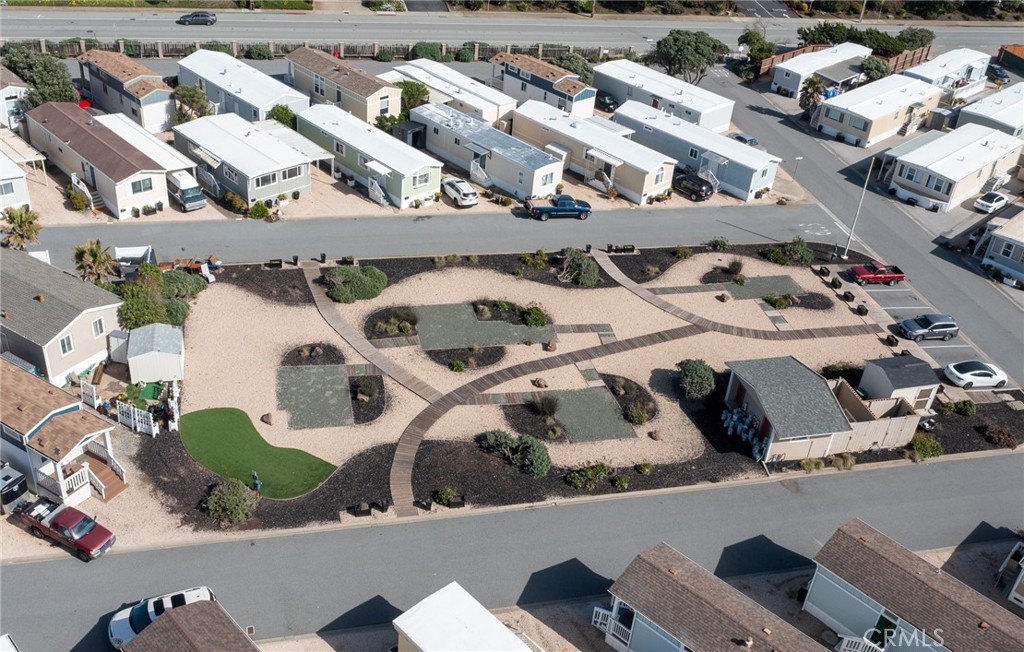 109 1st Avenue, Unit 3 Pacifica, CA 94044 - Photo 19 of 23 an aerial view of a house with a lot of car parked