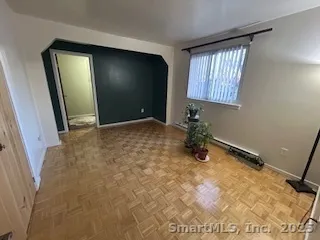 a view of an empty room and window