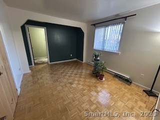 15 Paradiso Street, Unit 1 Norwalk, CT 06854 - Photo 6 of 16 a view of an empty room and window