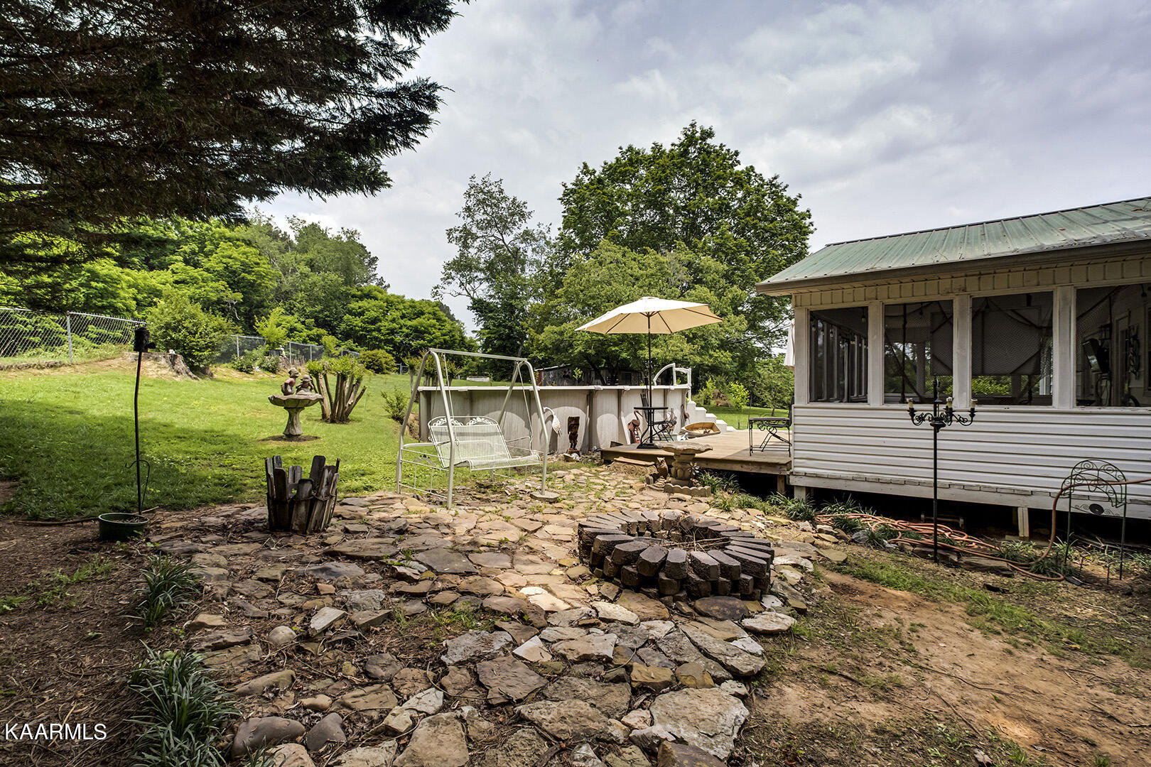204 Brahman Road Kingston, TN 37763 - Photo 43 of 48 43_BrahmanRoad_204_Patio-FirePit01