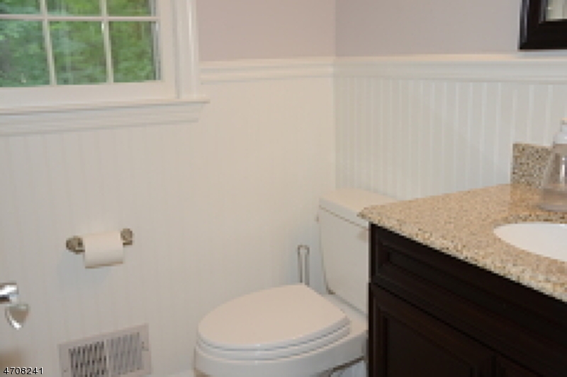 5 Deer Run Drive Randolph, NJ 07869 - Photo 11 of 25 a bathroom with a granite countertop toilet and a sink