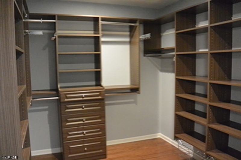5 Deer Run Drive Randolph, NJ 07869 - Photo 16 of 25 a view of walk in closet with empty racks