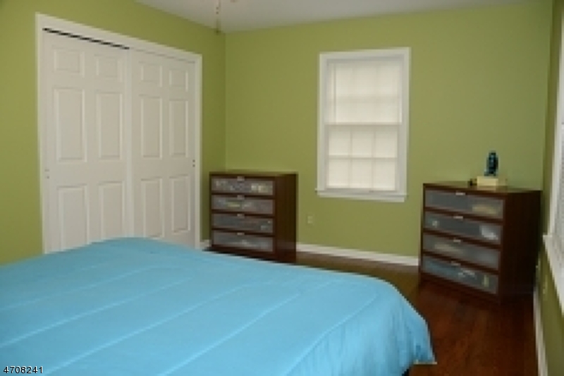5 Deer Run Drive Randolph, NJ 07869 - Photo 19 of 25 a bedroom with a bed and a window
