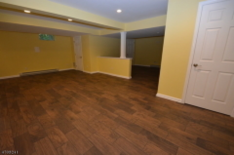 5 Deer Run Drive Randolph, NJ 07869 - Photo 22 of 25 wooden floor in an empty room