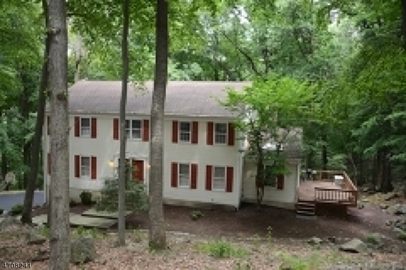 5 Deer Run Drive Randolph, NJ 07869 - Photo 25 of 25 a view of a blue house with a yard and large trees