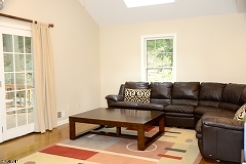 5 Deer Run Drive Randolph, NJ 07869 - Photo 9 of 25 a living room with furniture and a window