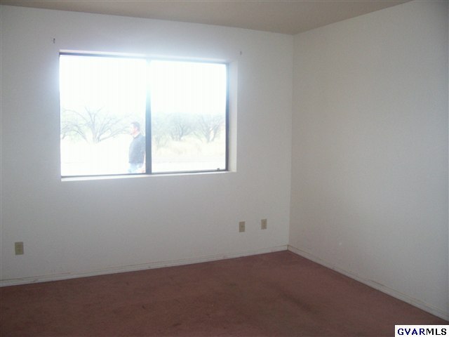 1271 Circulo Yerba Buena Rio Rico, AZ 85648 - Photo 5 of 10 an empty room with a window