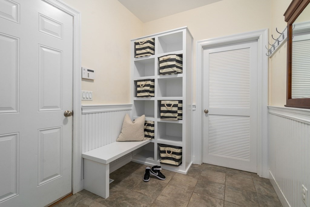 29 Smith Street Needham, MA 02492 - Photo 14 of 31 a view of walk in closet with empty racks