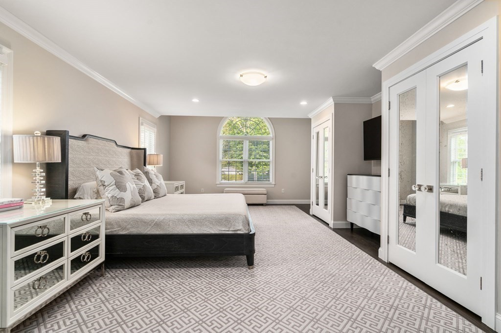 29 Smith Street Needham, MA 02492 - Photo 17 of 31 a bedroom with a bed and a large window