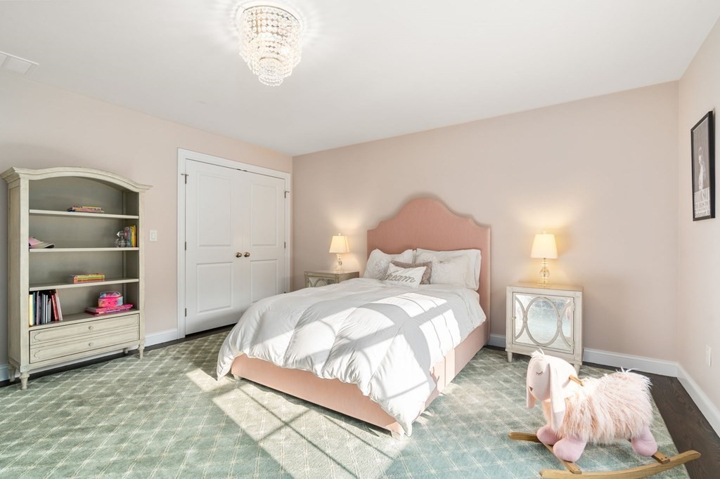 29 Smith Street Needham, MA 02492 - Photo 20 of 31 a bedroom with a bed and a window