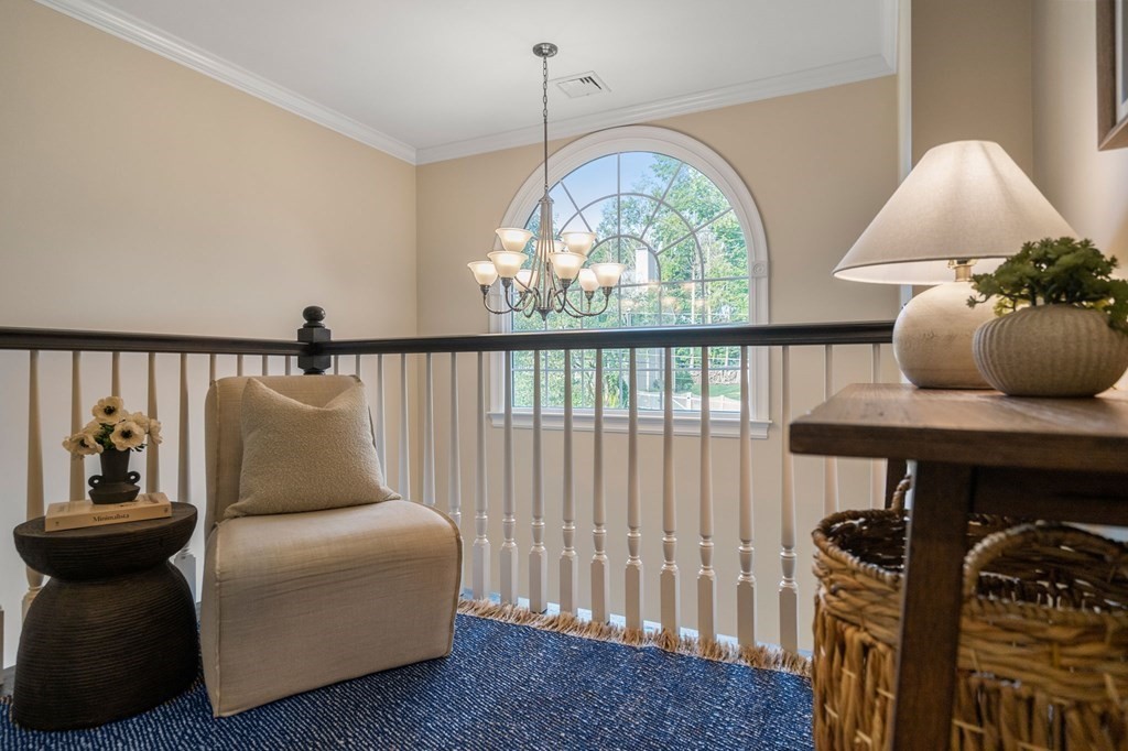 29 Smith Street Needham, MA 02492 - Photo 24 of 31 a living room with furniture and a large window