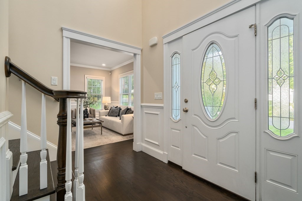 29 Smith Street Needham, MA 02492 - Photo 3 of 31 view of living room with furniture and a window
