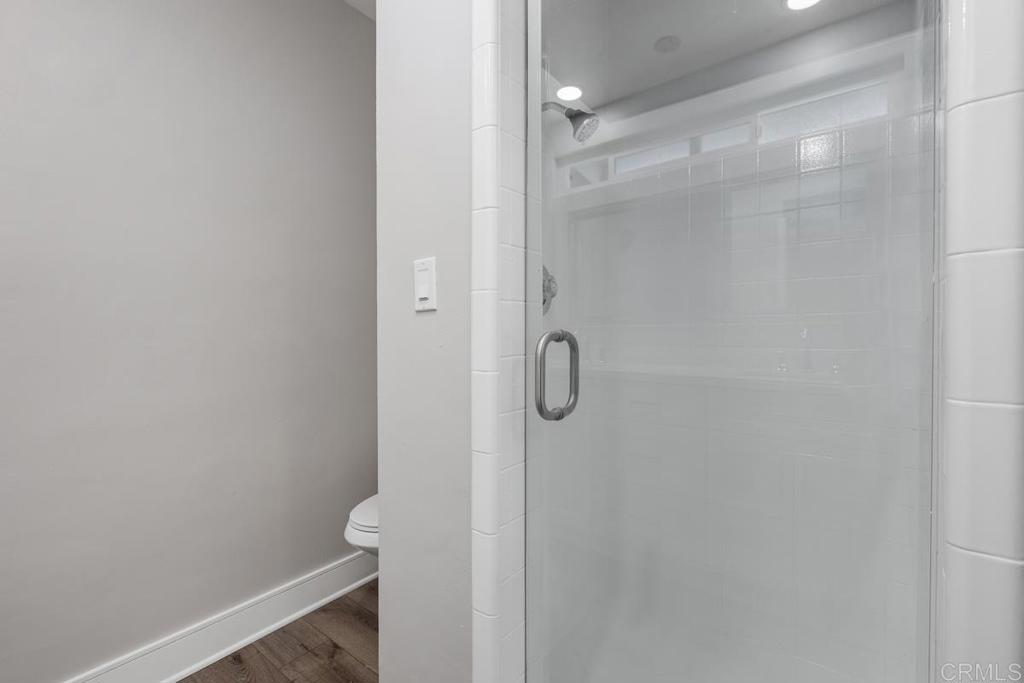 1134 Montura Road, Unit MAIN HOUSE San Marcos, CA 92078 - Photo 25 of 31 a bathroom with a glass shower door
