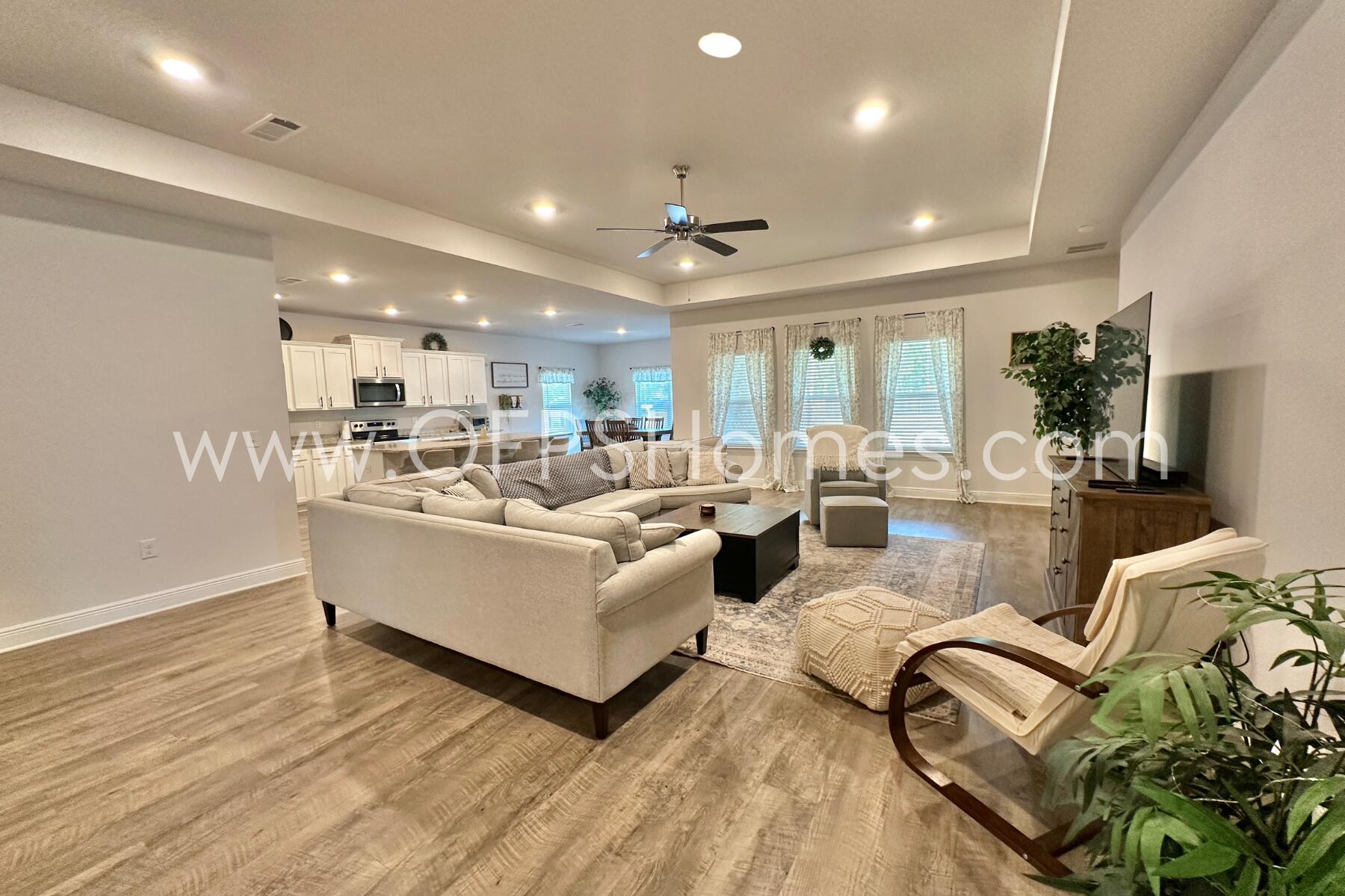 8090 Silver Maple Drive Milton, FL 32583 - Photo 14 of 42 a living room with furniture