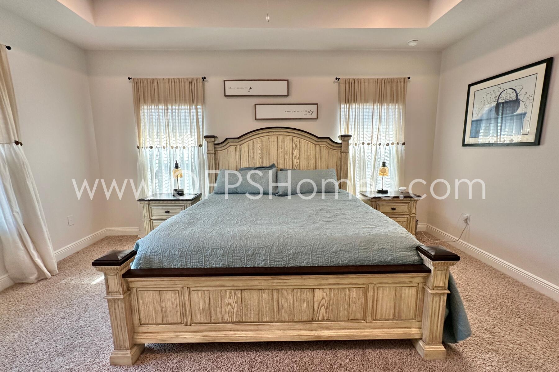 8090 Silver Maple Drive Milton, FL 32583 - Photo 32 of 42 a bedroom with a bed and window