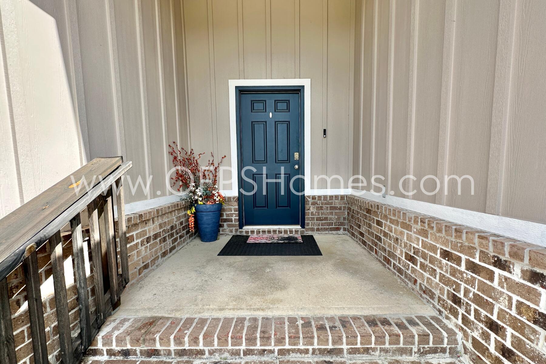 8090 Silver Maple Drive Milton, FL 32583 - Photo 5 of 42 a view of an entryway with wooden floor