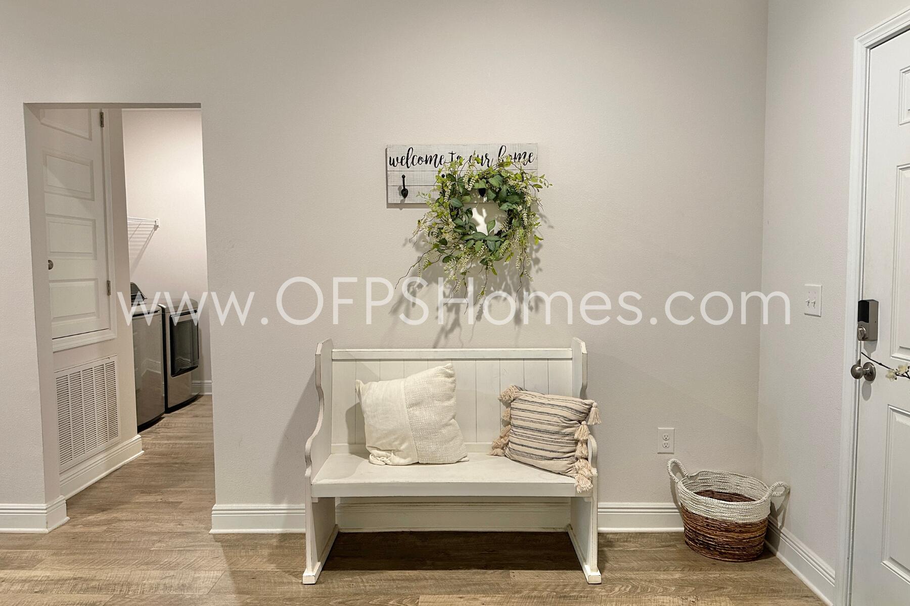 8090 Silver Maple Drive Milton, FL 32583 - Photo 6 of 42 a bathroom with a toilet a sink and mirror