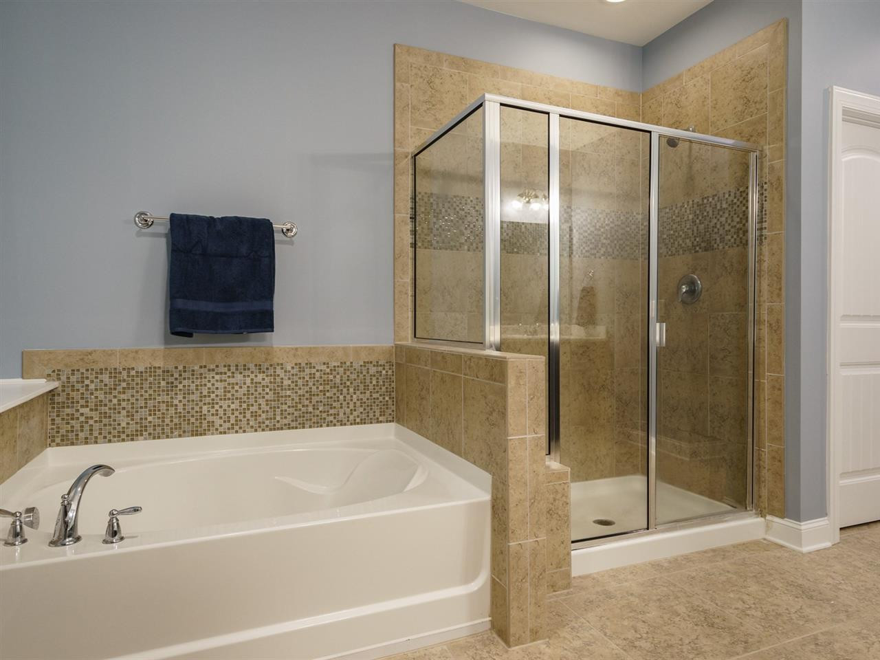 4844 Inwood Road Raleigh, NC 27603 - Photo 13 of 25 This lovely bath is like having your very own home spa. The garden tub with separate tile shower complete the package. Master Suite