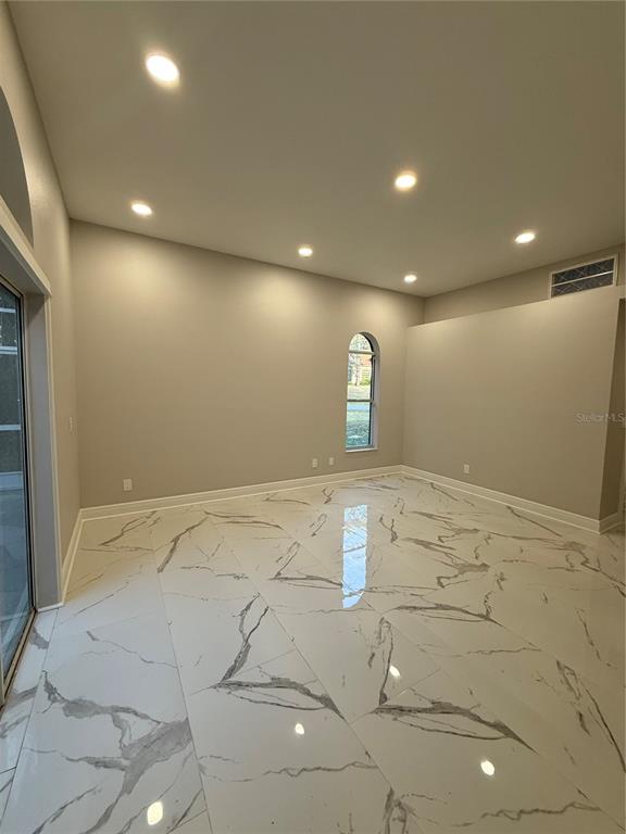 14273 Nugent Circle Spring Hill, FL 34609 - Photo 19 of 27 a view of lot of empty room