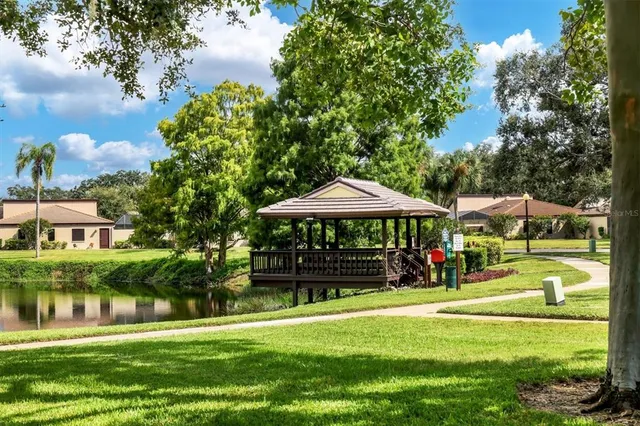 a backyard of a house with lots of green space