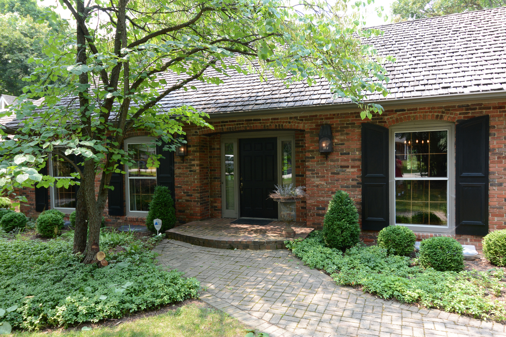 4-n034 Thornapple Road St. Charles, IL 60174 - Photo 1 of 44 a front view of a house with garden