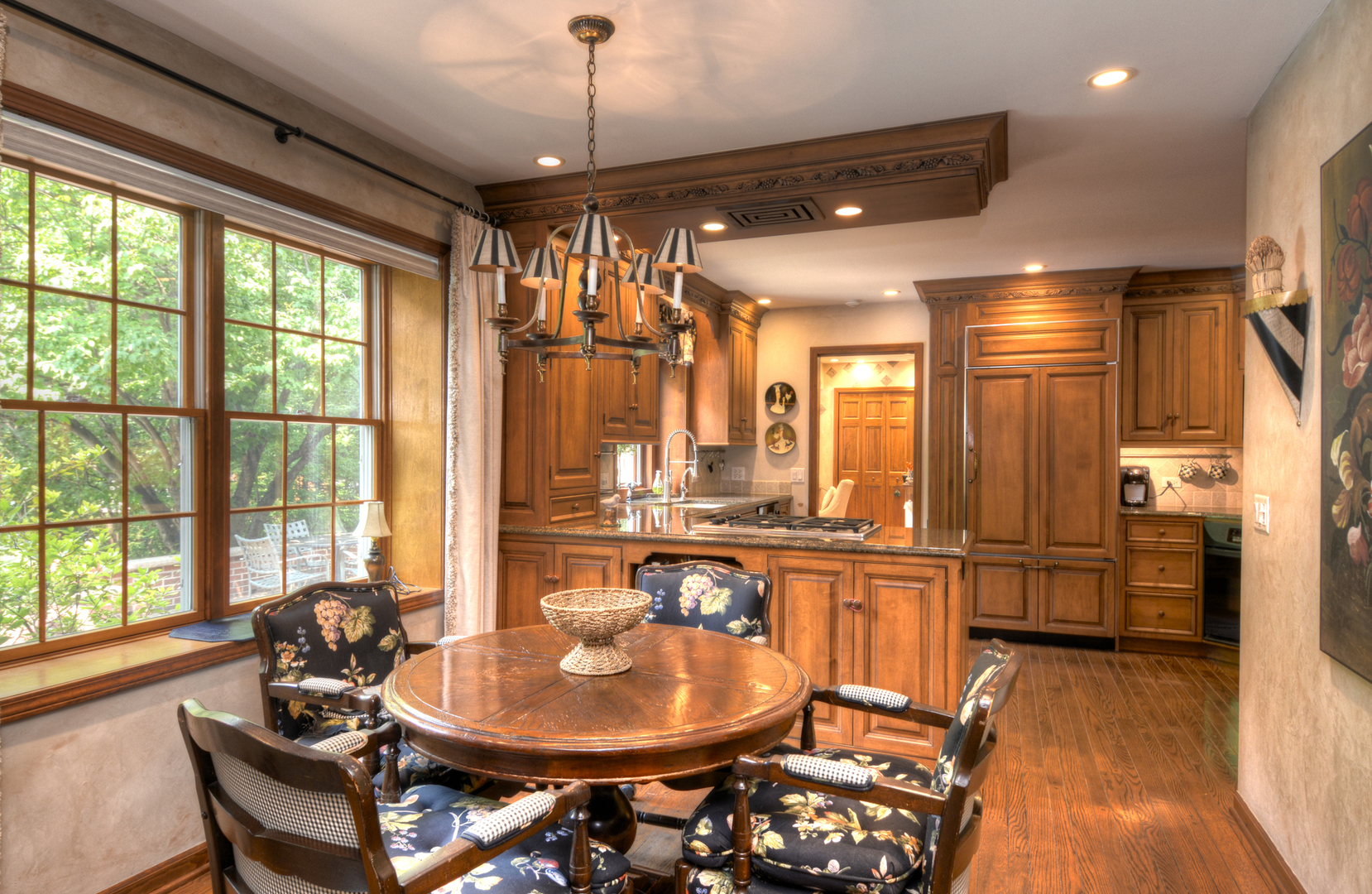4-n034 Thornapple Road St. Charles, IL 60174 - Photo 19 of 44 a dining room with furniture a chandelier and wooden floor