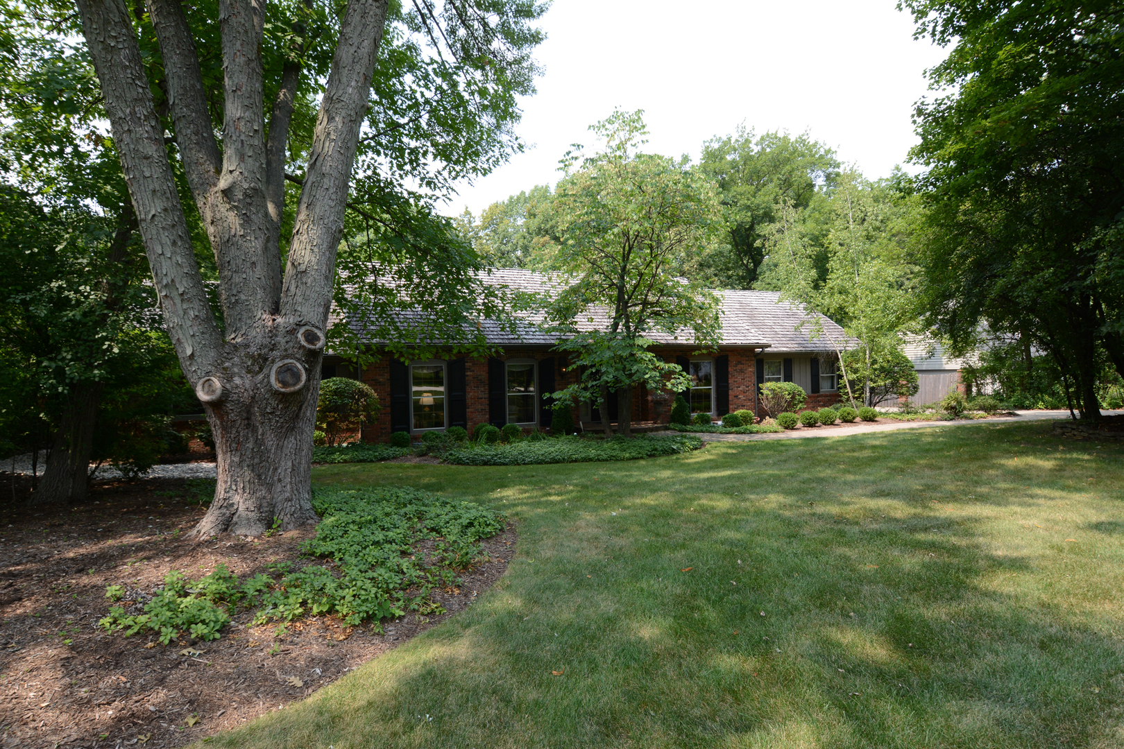 4-n034 Thornapple Road St. Charles, IL 60174 - Photo 3 of 44 a front view of a house with garden