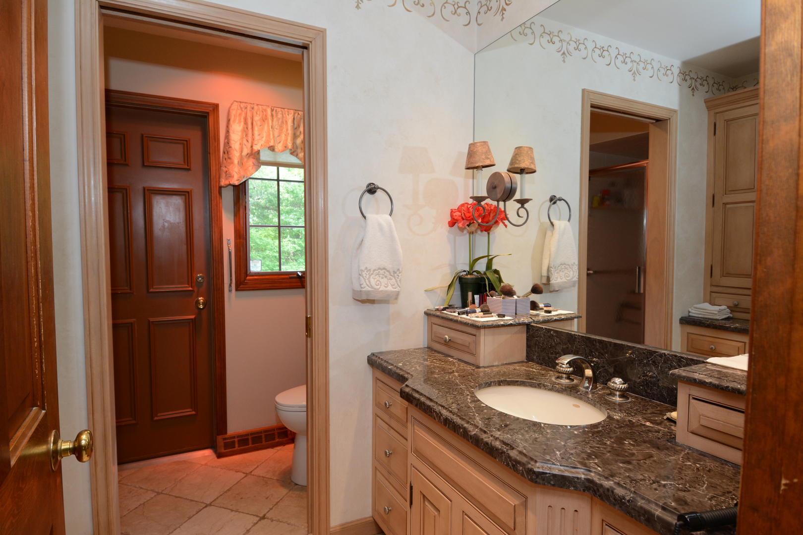 4-n034 Thornapple Road St. Charles, IL 60174 - Photo 24 of 44 a bathroom with a granite countertop sink and a mirror