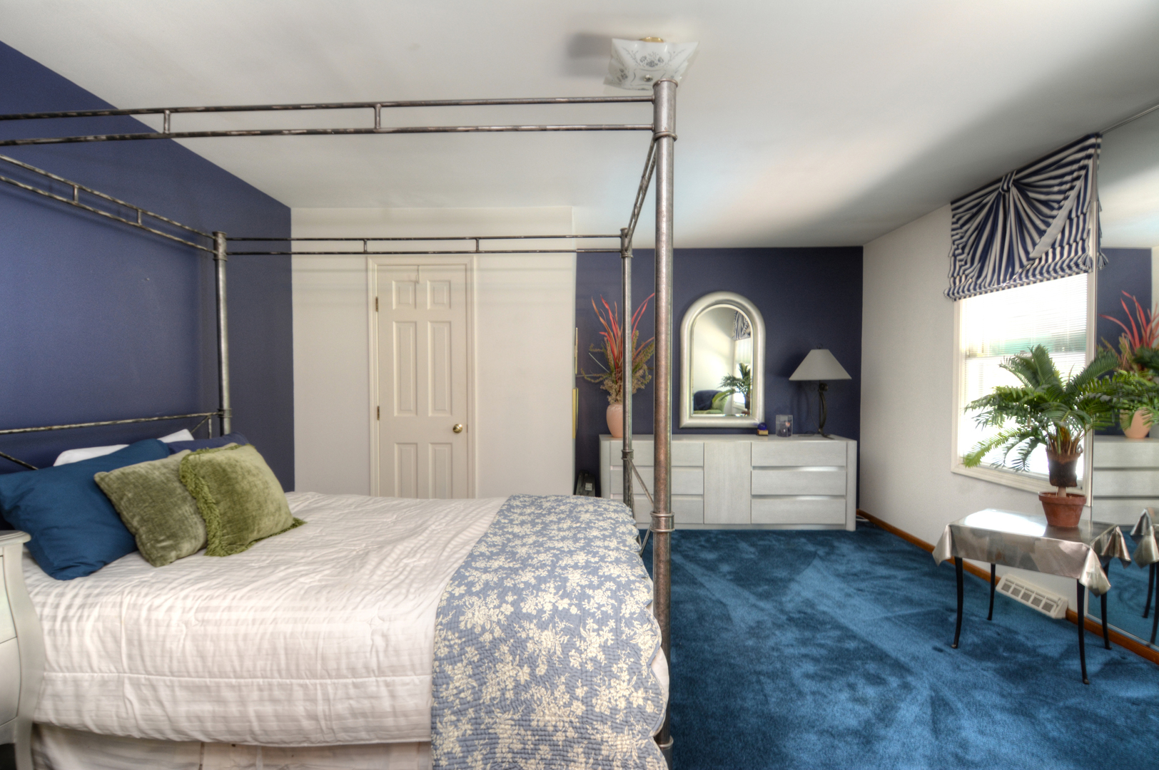 4-n034 Thornapple Road St. Charles, IL 60174 - Photo 25 of 44 a bedroom with a bed and a potted plant