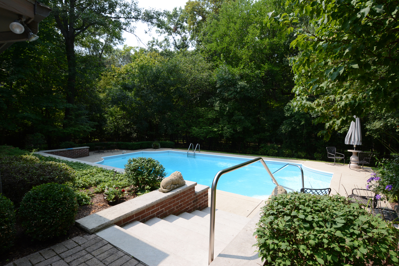 4-n034 Thornapple Road St. Charles, IL 60174 - Photo 32 of 44 a view of a swimming pool with a yard