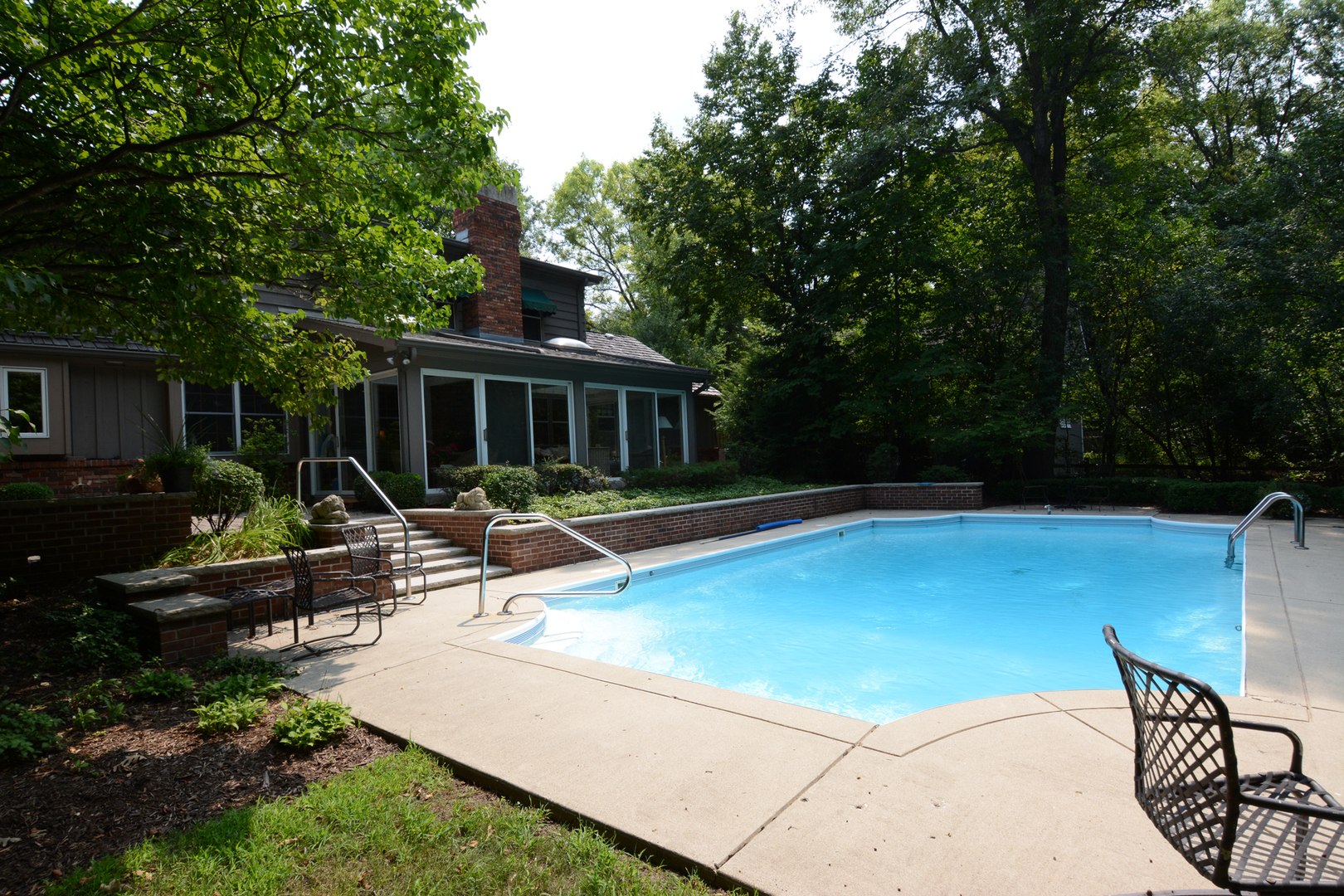 4-n034 Thornapple Road St. Charles, IL 60174 - Photo 33 of 44 a view of a house with swimming pool and sitting area