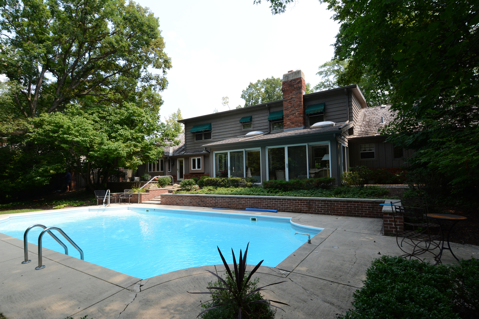 4-n034 Thornapple Road St. Charles, IL 60174 - Photo 35 of 44 a view of a house with swimming pool and sitting area