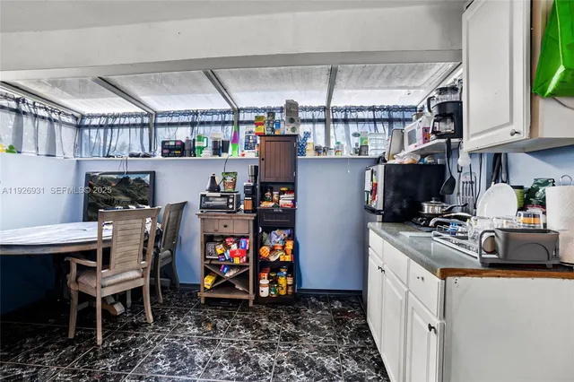a view of a storage & utility room with stuff