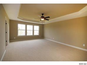 1305 Ridgehaven Road, Unit 165 Waxhaw, NC 28173 - Photo 11 of 16 a view of an empty room with a window