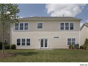 1305 Ridgehaven Road, Unit 165 Waxhaw, NC 28173 - Photo 16 of 16 a front view of a house with a yard