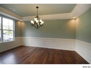 1305 Ridgehaven Road, Unit 165 Waxhaw, NC 28173 - Photo 3 of 16 a view of room with window and hardwood floor