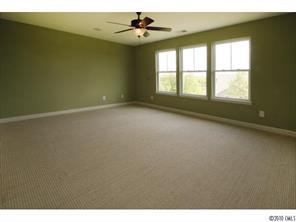 1305 Ridgehaven Road, Unit 165 Waxhaw, NC 28173 - Photo 10 of 16 a view of an empty room with a window