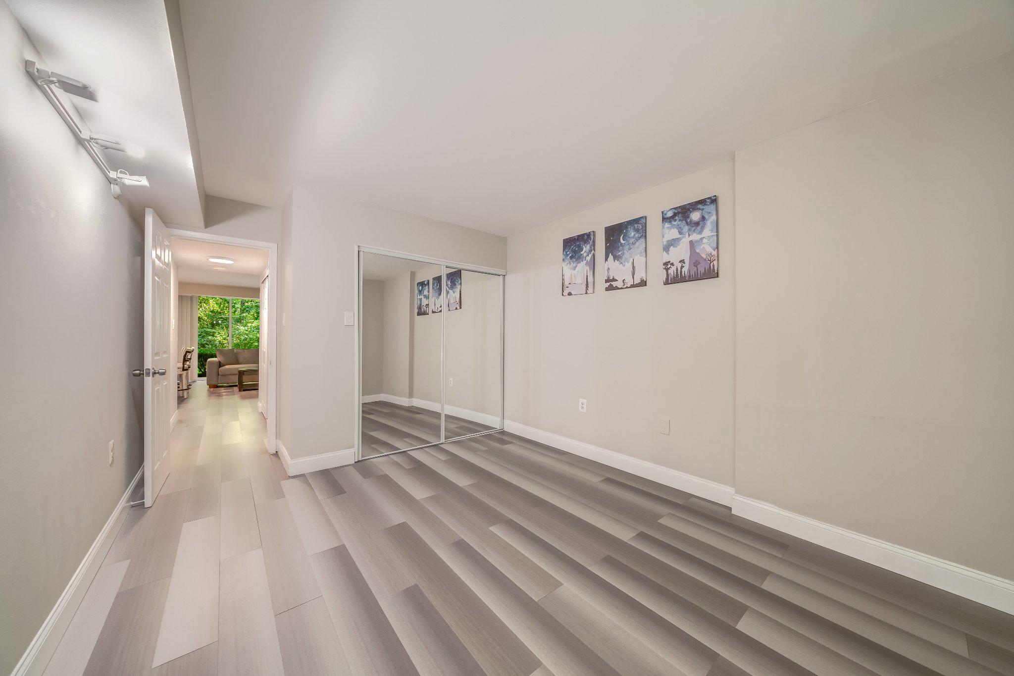 1429 Northgate Square, Unit 2A Reston, VA 20190 - Photo 20 of 25 a view of an empty room and glass door