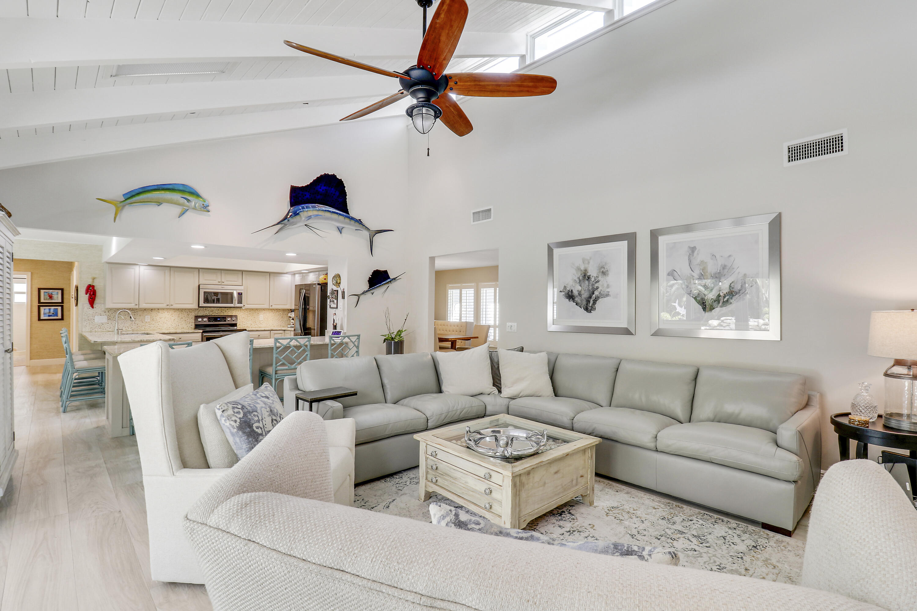6372 North 197th Place Jupiter, FL 33458 - Photo 24 of 77 a living room with furniture and a ceiling fan