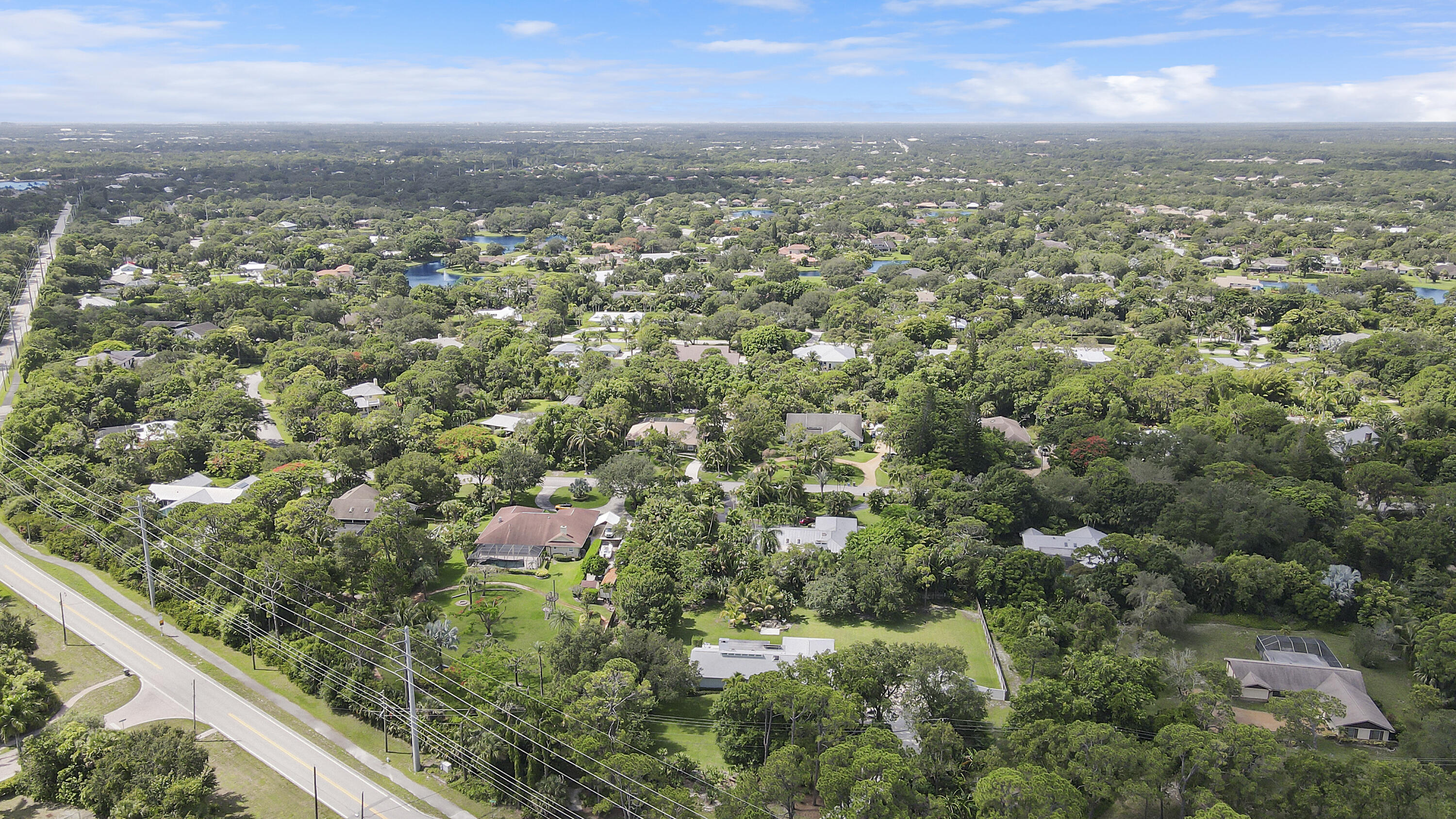 6372 North 197th Place Jupiter, FL 33458 - Photo 56 of 77 an aerial view of residential houses with city view