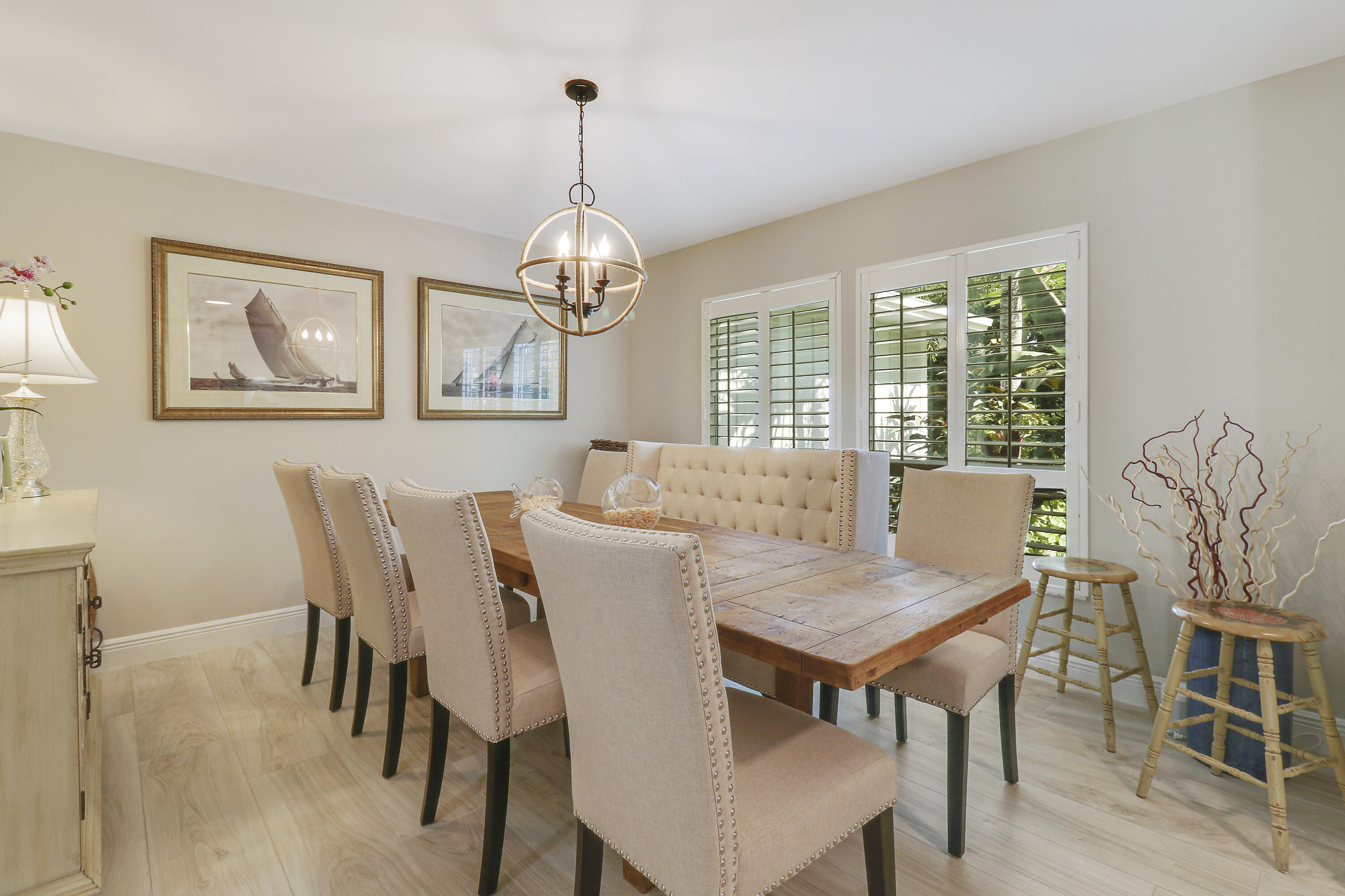 6372 North 197th Place Jupiter, FL 33458 - Photo 8 of 77 a view of a dining room with furniture wooden floor and chandelier