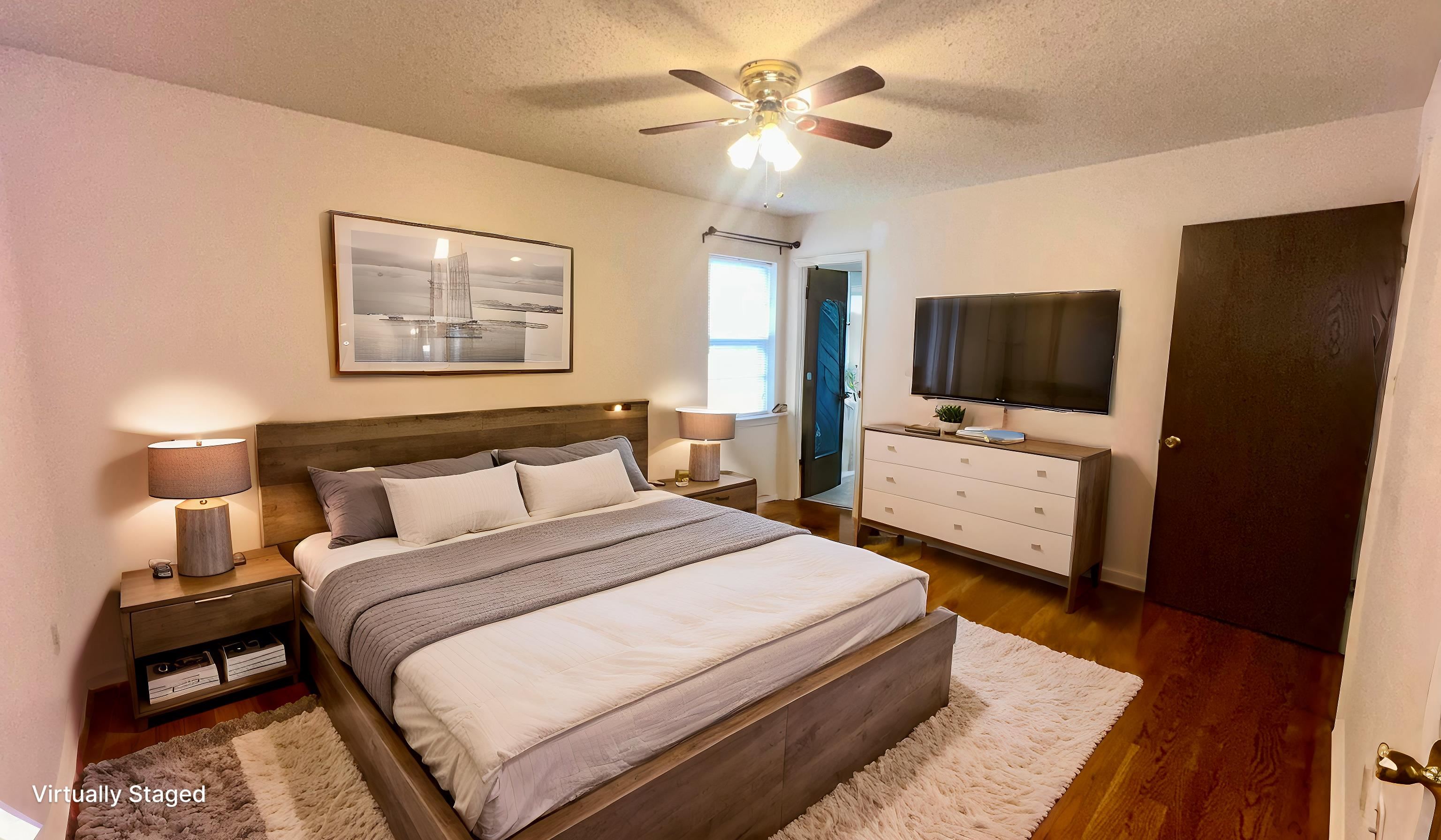 3250 Altruria Road Bartlett, TN 38134 - Photo 12 of 31 a bedroom with a bed and a flat screen tv