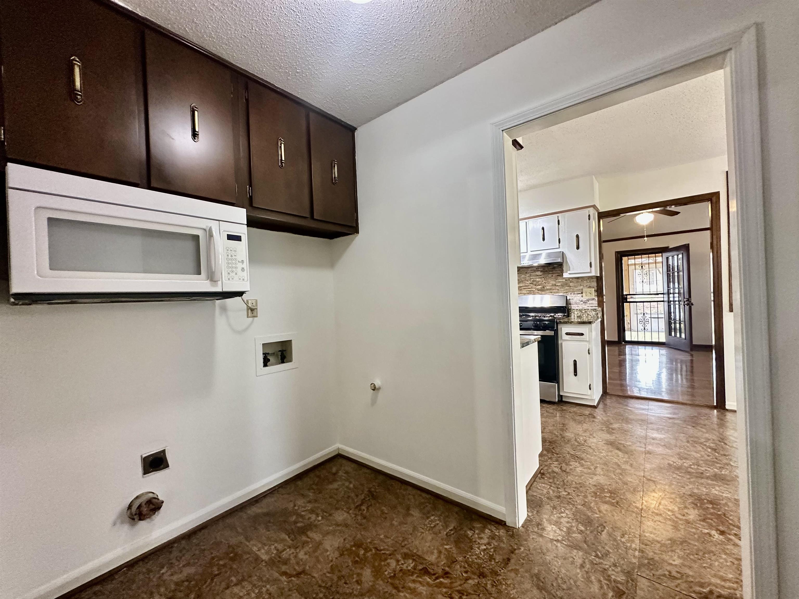 3250 Altruria Road Bartlett, TN 38134 - Photo 23 of 31 a view of a kitchen with a sink and cabinets